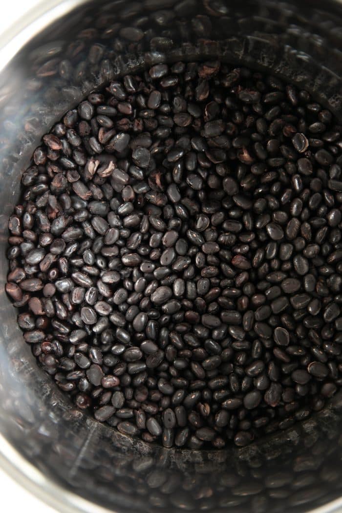 Image of an Instant Pot filled with perfectly cooked black beans.