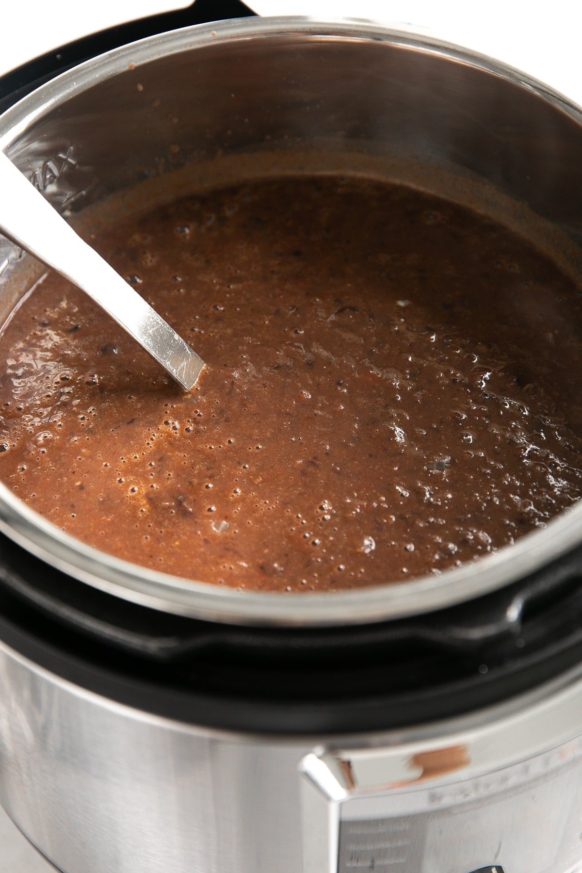 Image of blended black bean soup in a large Instant Pot.