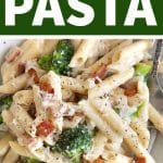 Close-up of creamy penne pasta tossed with broccoli florets, crispy bacon pieces, and grated Parmesan cheese.