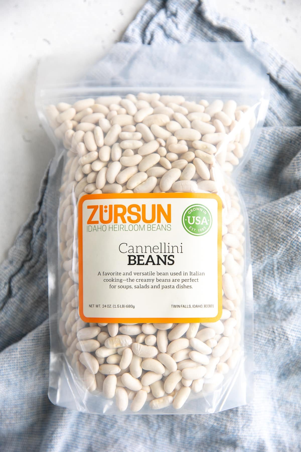 Unopened bag filled with Zursun Brand dried cannellini beans.