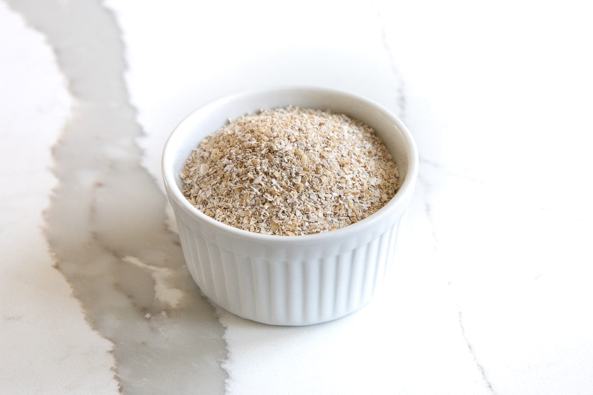 Image of a small white ramekin filled with oat bran