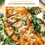 Vertical Pinterest pin for Chicken Florentine featuring a plated serving of sliced chicken in creamy spinach sauce in a cream-colored bowl with a dark blue rim. A gold fork rests on the right side of the bowl, and fresh parsley leaves and a wooden bowl of grated parmesan appear around the edges. At the top, a large light gray text box contains black uppercase text reading โCHICKEN FLORENTINEโ and smaller uppercase text below reading โEASY WEEKNIGHT DINNER RECIPE,โ separated by a thin golden-yellow line. Small black text at the bottom reads โtheforkedspoon.com.โ
