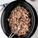 Pinterest Pin Image for slow cooker pulled pork recipe with one image and text overlay.