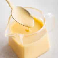 Image showcasing How to Make Hollandaise Sauce - The Forked Spoon