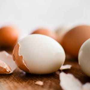 Perfect hard boiled egg with the shell almost completely removed.