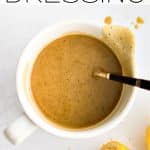 lemon tahini dressing pinterest pin image with text overlay