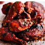 Pinterest Pin for baked BBQ chicken with three images and text overlay.