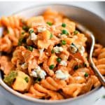 Pinterest Pin for buffalo chicken pasta salad with text overlay.