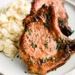 Pinterest Pin image for baked pork chops recipe with one image and text overlay.