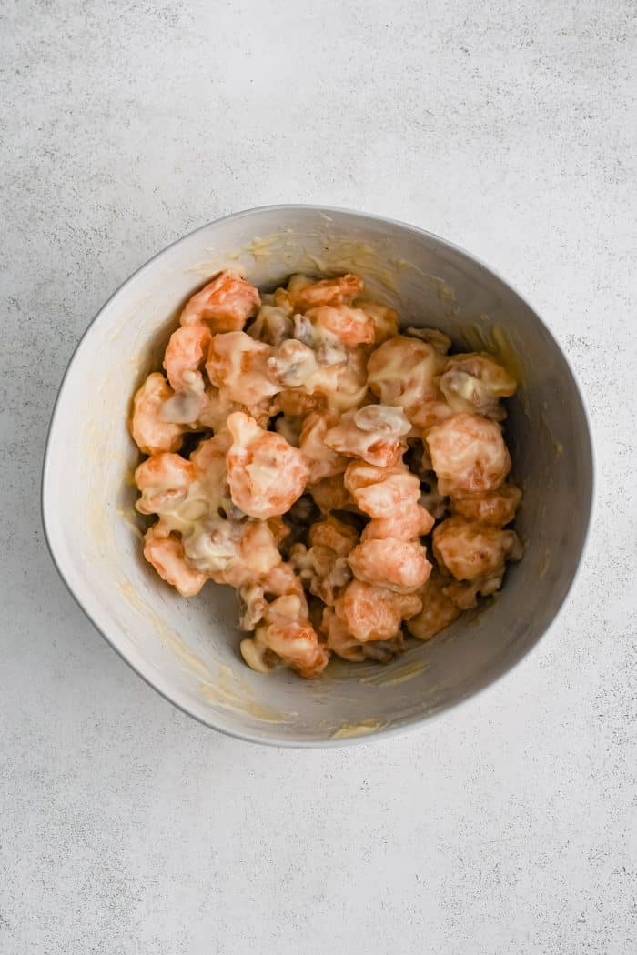 Crispy fried shrimp and candied walnuts gently mixed with creamy mayo-based sauce for honey walnut shrimp.