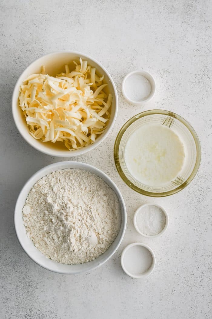 All of the ingredients needed to make Homemade Buttermilk Biscuits in individual measuring cups and ramekins.