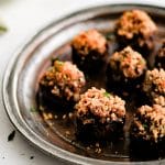 Pinterest Pin for sausage stuffed mushrooms recipe with text overlay.
