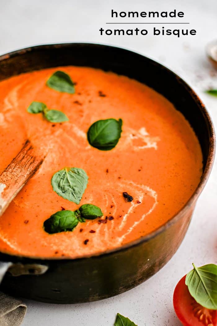 Pinterest Pin for creamy tomato bisque soup recipe with text overlay.