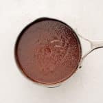 Homemade Dr. Pepper BBQ sauce reduced by half, thickened, and darkened in color.