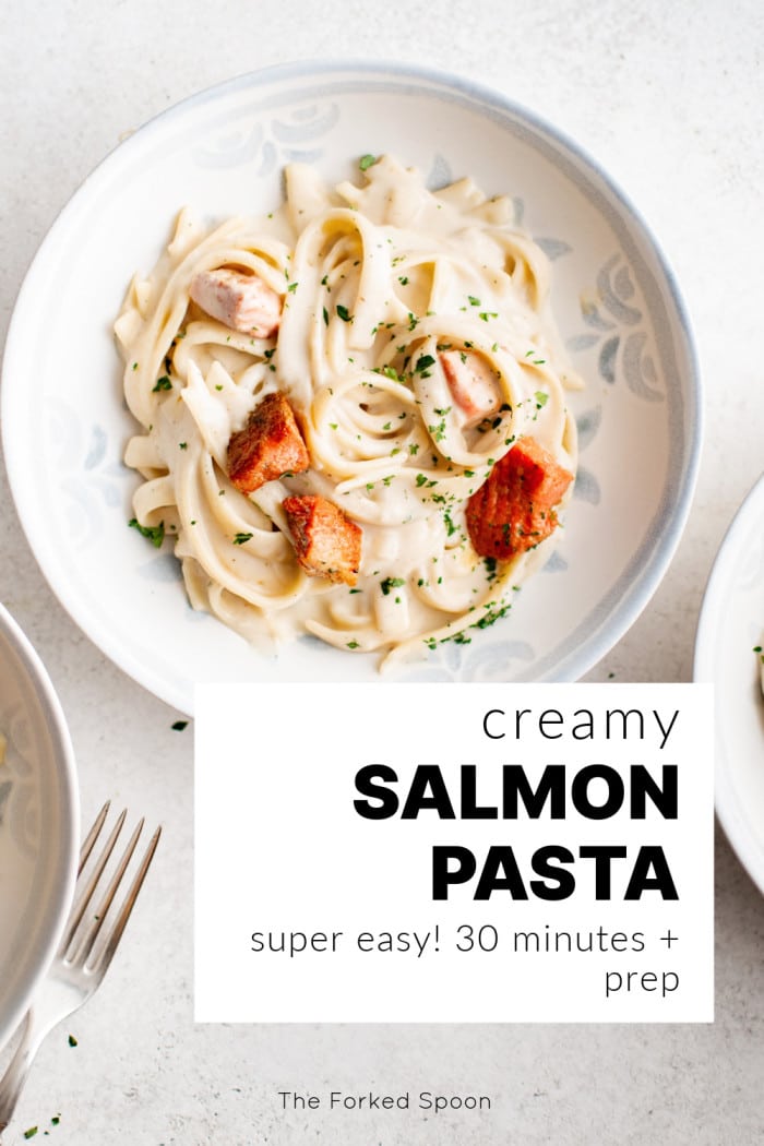 Bowl of creamy salmon pasta with text overlay reading “Creamy Salmon Pasta – super easy! 30 minutes + prep”