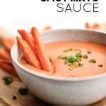 Bowl of spicy mayo topped with green onions and sweet potato fries with text "Spicy Mayo Sauce"