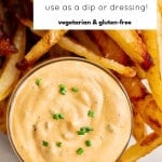 A close-up of fries served with a bowl of buffalo ranch sauce, labeled โuse as a dip or dressingโ and tagged vegetarian and gluten-free.