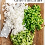 Diced onion, green bell pepper, and celery on a wooden cutting board with a knife with text box and text overlay "What is the Cajun Holy Trinity; Plus How to Cook and Use It"