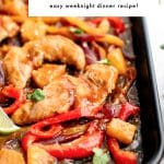 Close-up of Hawaiian Chicken baked on a sheet pan with pineapple chunks, red and yellow bell peppers, red onion, and juicy chicken tenderloins coated in glossy Hawaiian sauce, with text overlay reading โSheet Pan Hawaiian Chicken, easy weeknight dinner recipe.โ